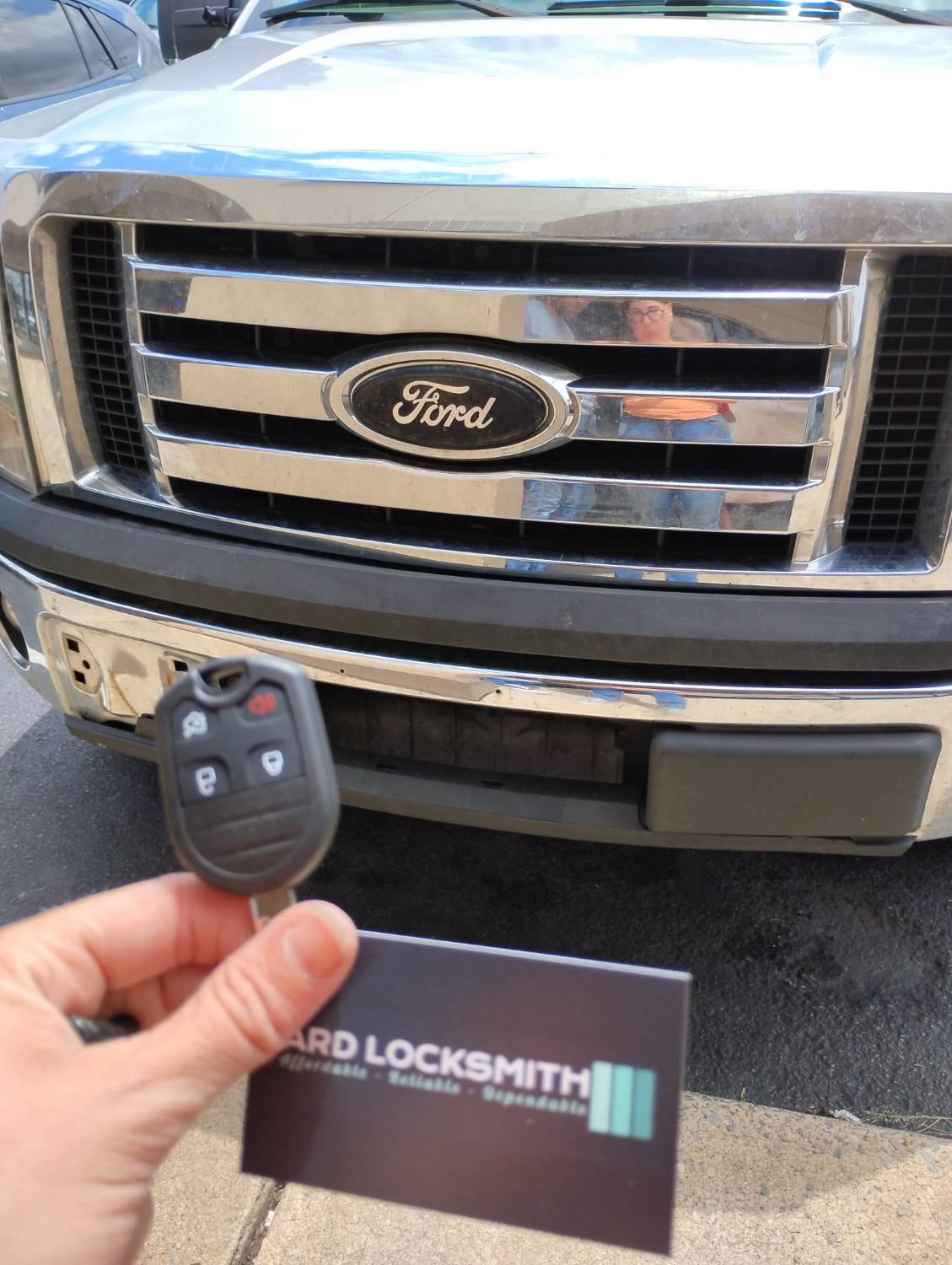Ford F-150 remote-head key and ARD Locksmith card documented after service