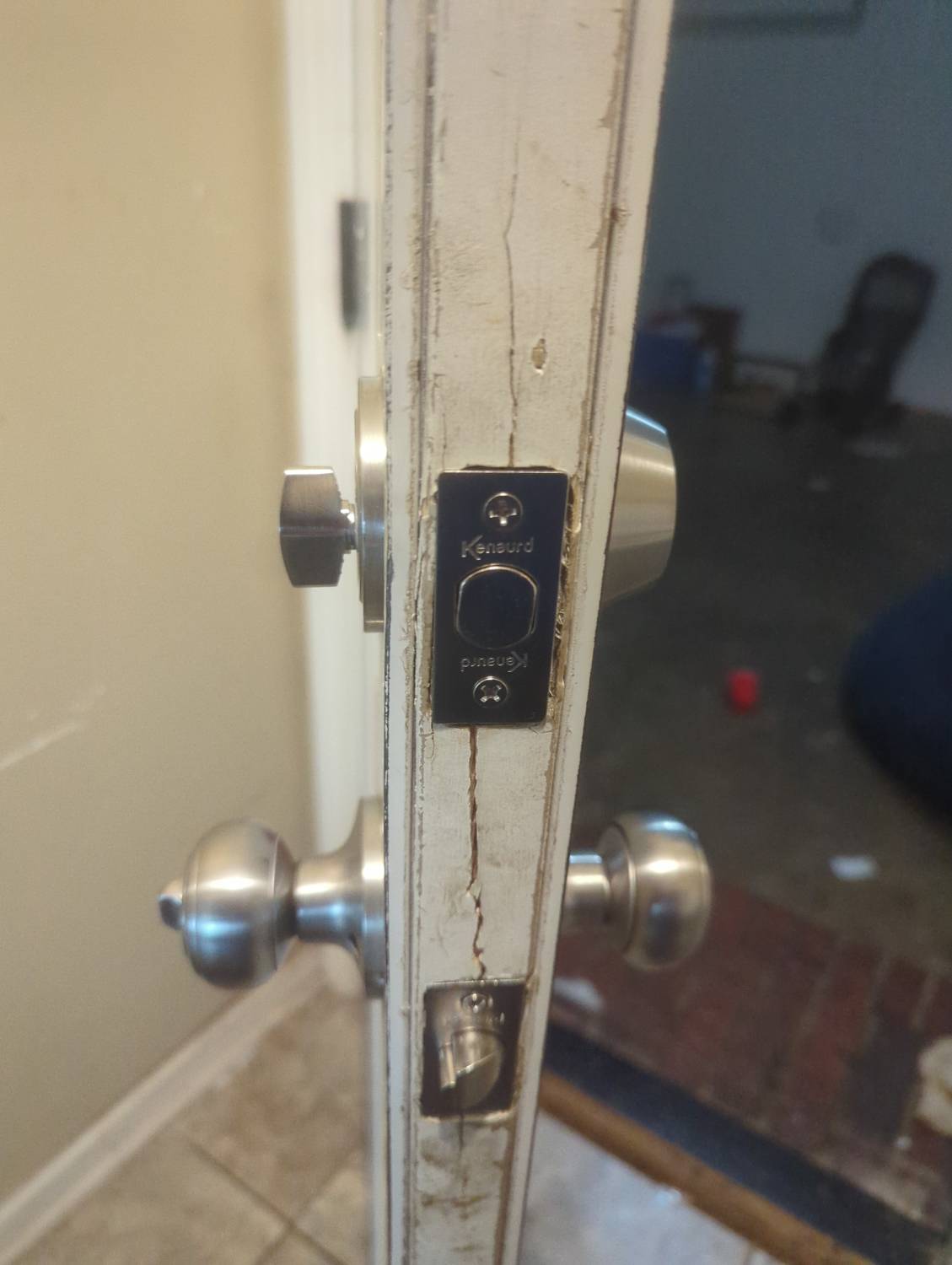 New deadbolt and doorknob installed at a Benton rental home