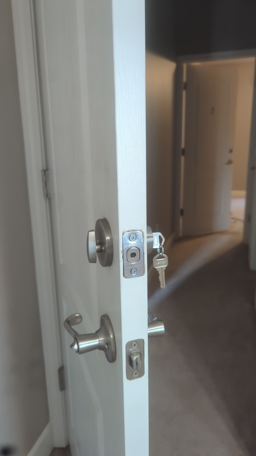 New deadbolt and key documented after residential locksmith service in Bryant Arkansas