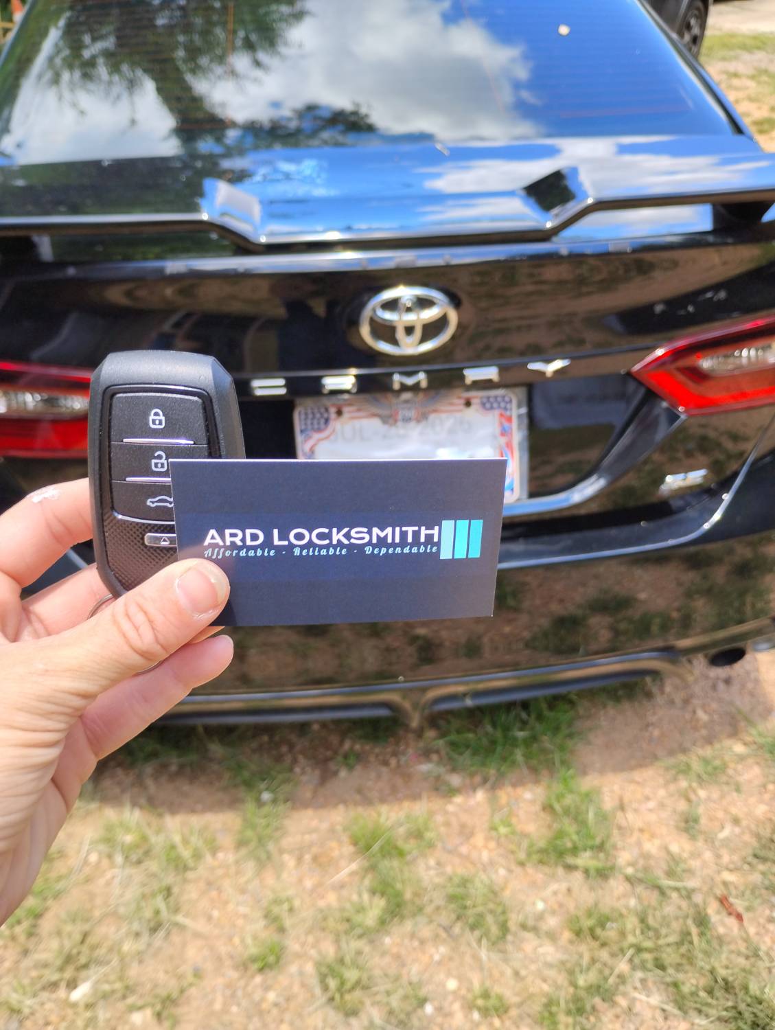 Toyota Camry smart key and ARD Locksmith card documented after automotive key service