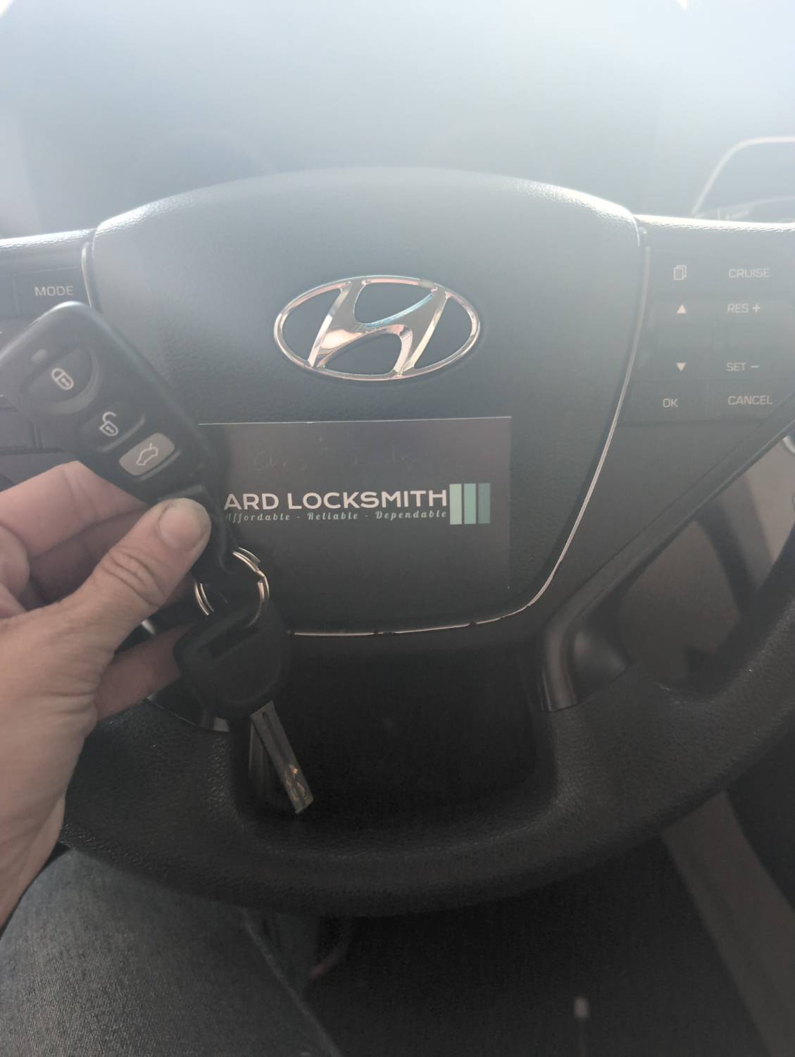 Hyundai Sonata key and ARD Locksmith card documented after automotive key service