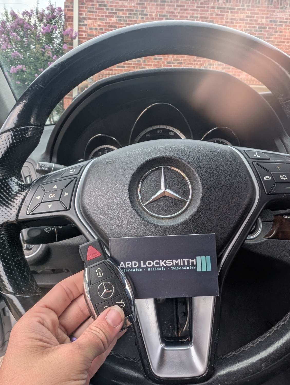 Mercedes E350 key fob and ARD Locksmith card documented after programming
