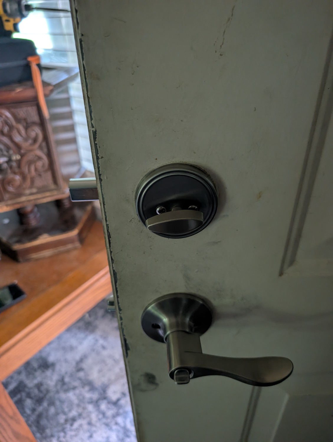 Residential deadbolt and lever hardware documented after unlocking and lock replacement service