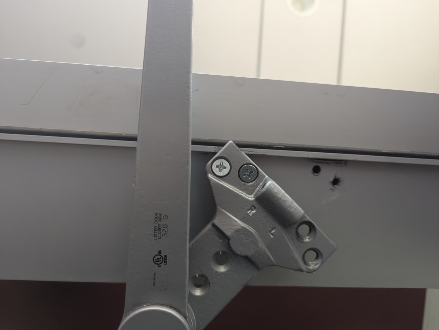 Commercial door closer arm and hinge hardware serviced in Little Rock
