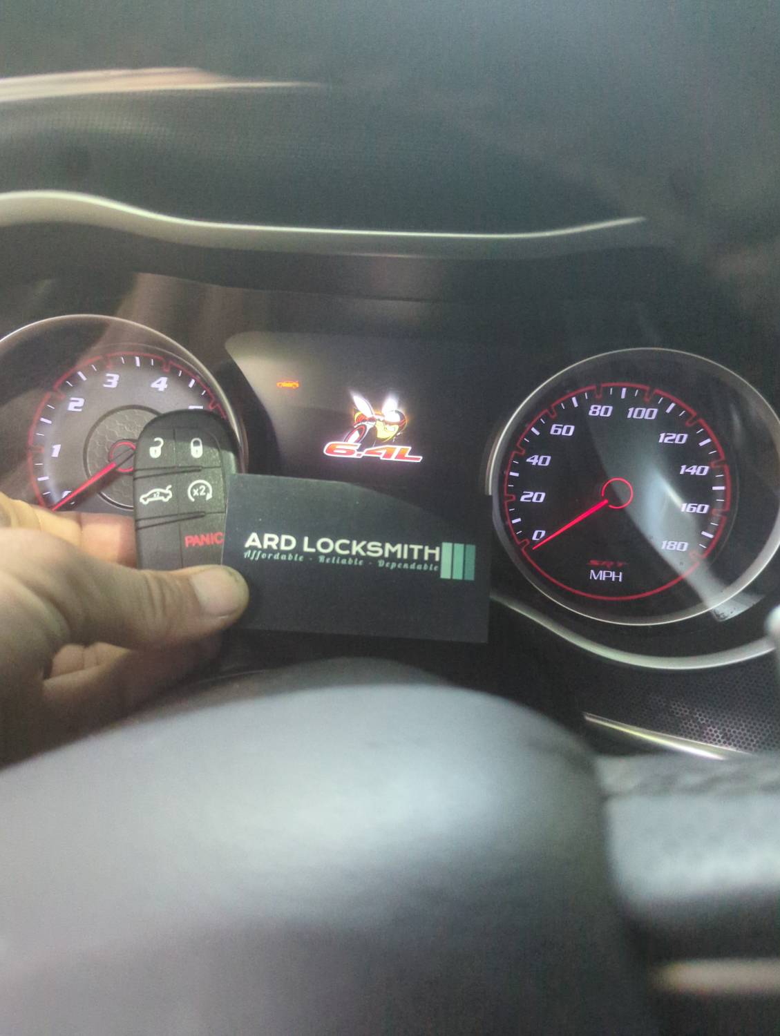 Completed Dodge Charger smart key documented with an ARD Locksmith card