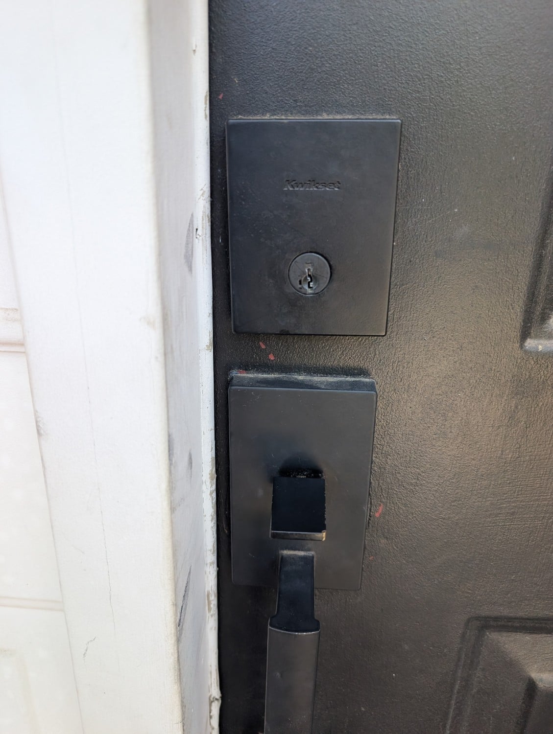 Residential Kwikset deadbolt and handle documented after rekeying
