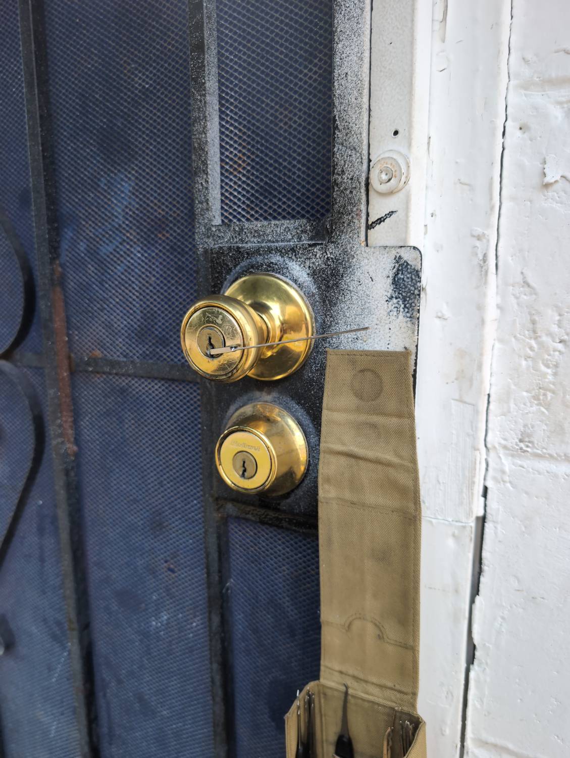 Commercial door lock documented during an unlocking service