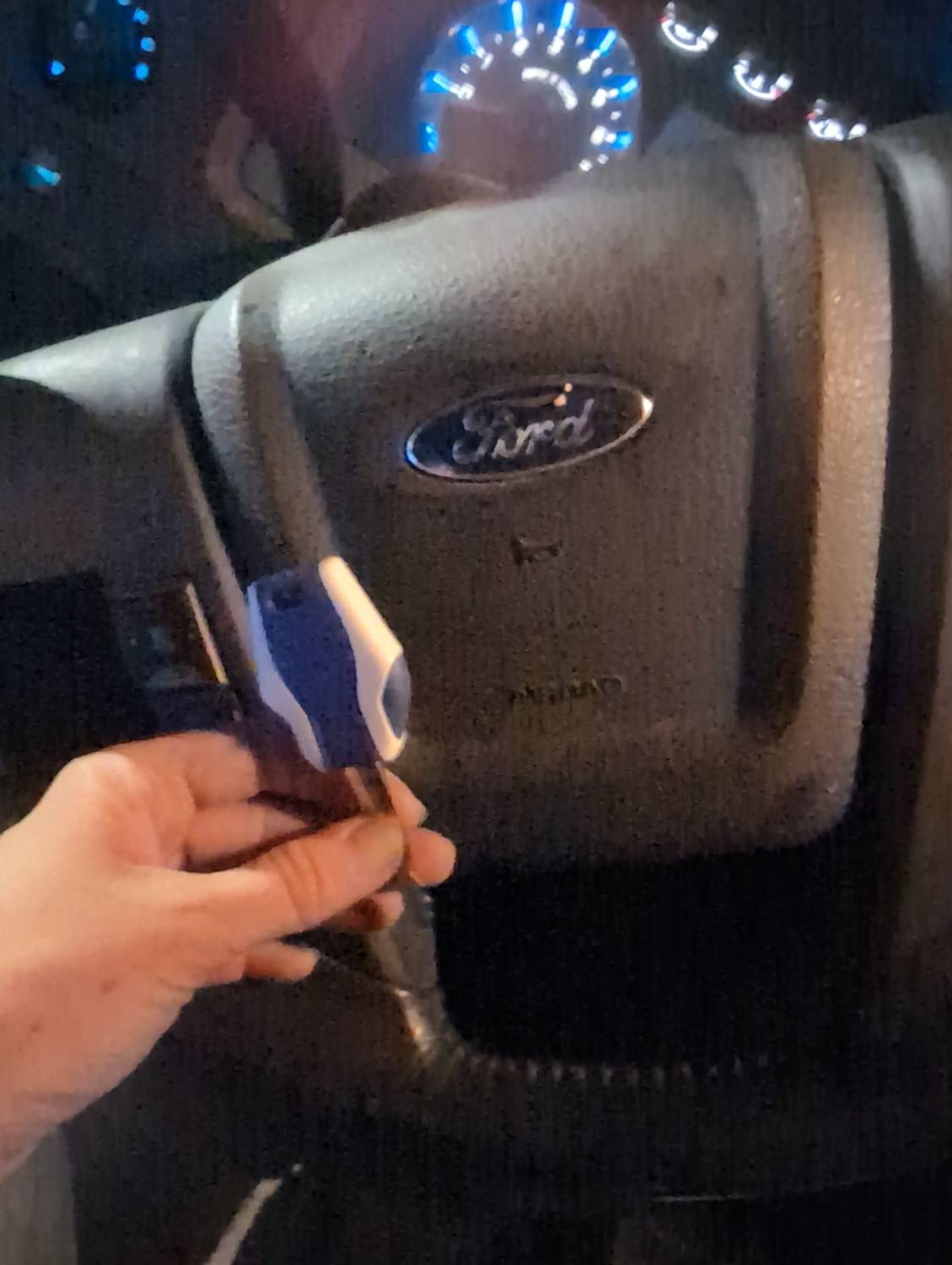 Completed Ford F-150 transponder key documented inside the vehicle
