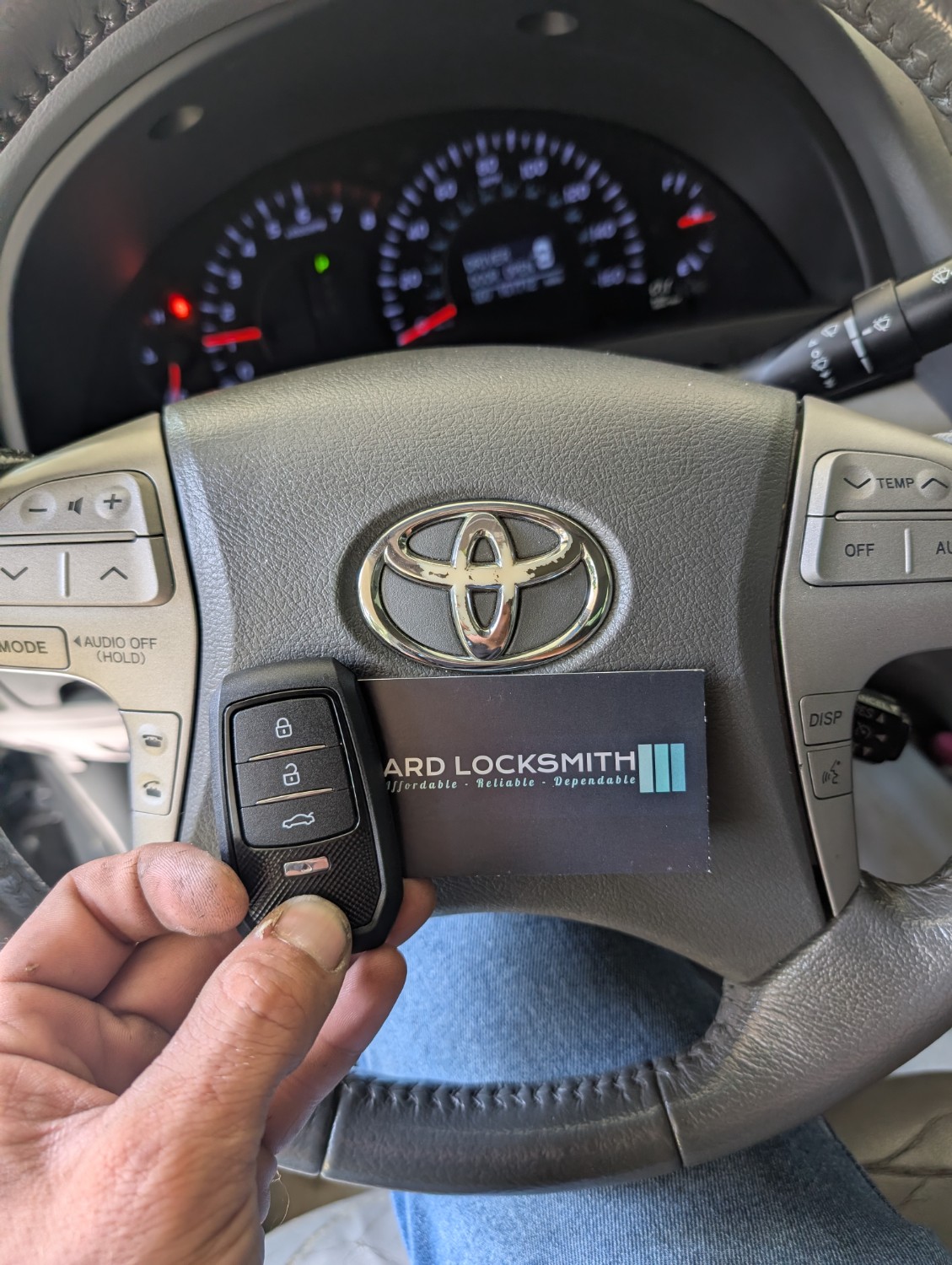 Completed Toyota Camry replacement key and remote documented with an ARD Locksmith card